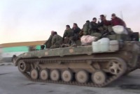 آلية عسكرية لقوات النظام في ريف حلب ـ رويترز