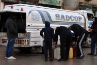 توزيع مازوت التدفئة على الأهالي في مدينة جرمانا بريف دمشق – "صحيفة تشرين"