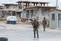 عناصر من قوات انلظام في درعا ـ AFP