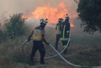 جانب من إخماد حريق الدريّة - الدفاع المدني السوري