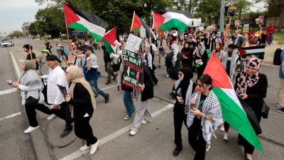 مسيرة لإحياء الذكرى الـ 75 للنكبة الفلسطينية في ميشيغان، الولايات المتحدة، 13 أيار/مايو 2023 (AFP)