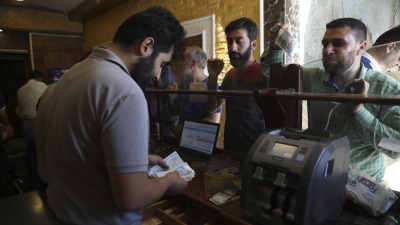 مكتب صرافة في مدينة إدلب شمال غربي سوريا - AP