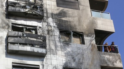المبنى المستهدف بالغارة الإسرائيلية على حي كفرسوسة بدمشق (AFP/21 شباط 2024)