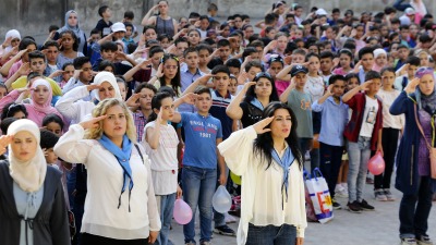 تحية العلم في إحدى مدارس العاصمة دمشق ـ AFP